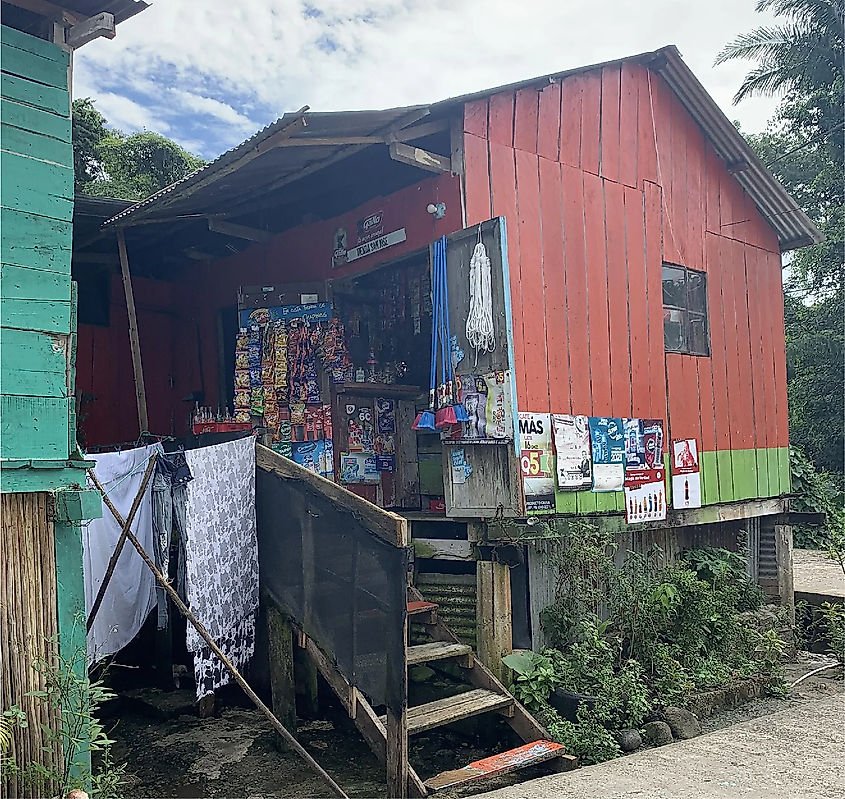 A rickety-looking wooden shop that also doubles as a house.