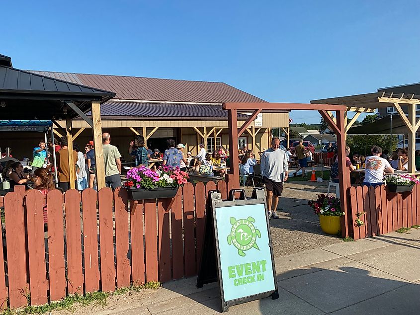 An outdoor brewery patio populated for a Great Lakes Endurance event. 