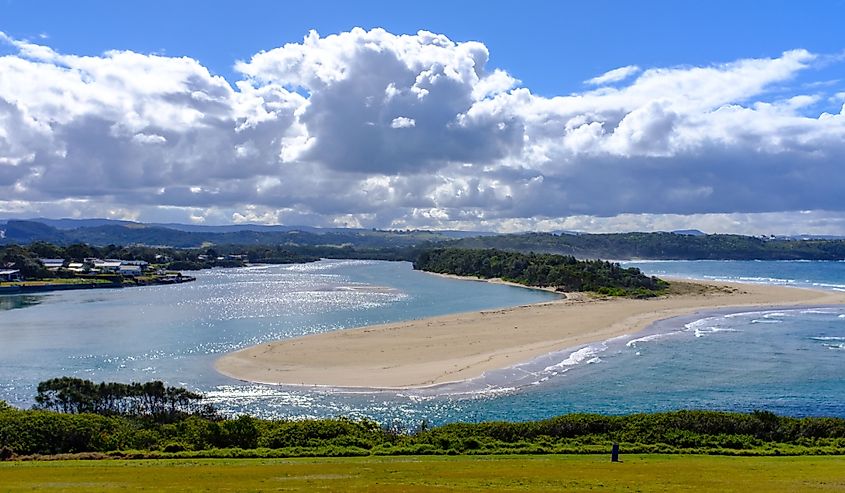 View of an approaching storm over Minnamurra river and sand spit out to the sea, Minnamurra, New South Wales, Australia