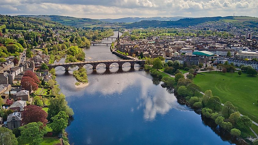 The meandering River Tay in Perth, Scotland, with a picturesque view of the city.