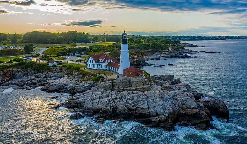 Aerial view of the Portland Head Lighthouse at sunset at Fort Williams Park in Cape Elizabeth, Maine