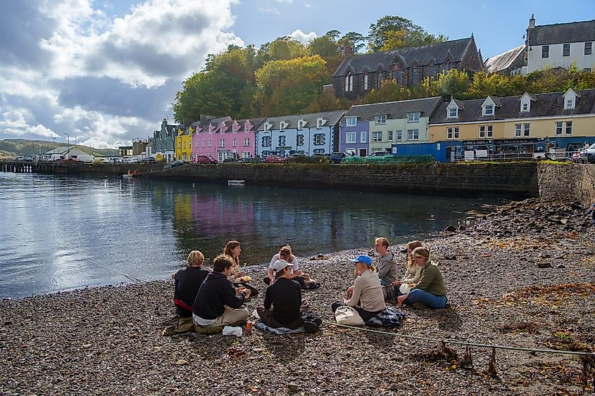 People enjoying a picnic in Portree, Scotland