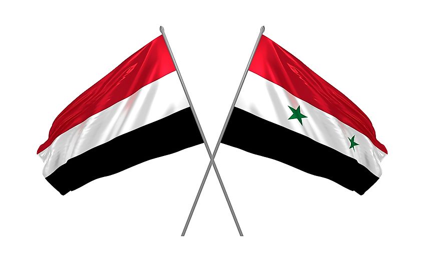 The flag of Yemen, left, and the flag of Syria.
