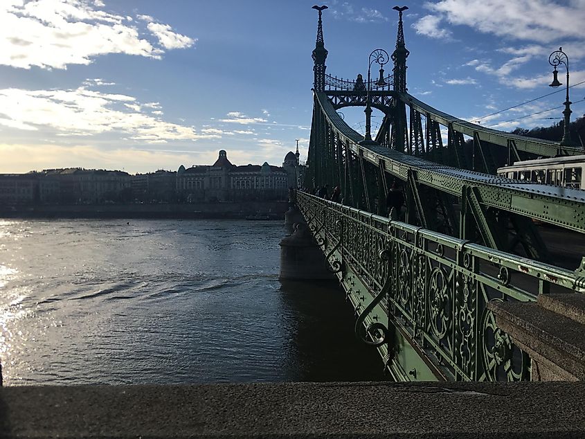 The big green Liberty Bridge leading across the Danube River in Budapest. 