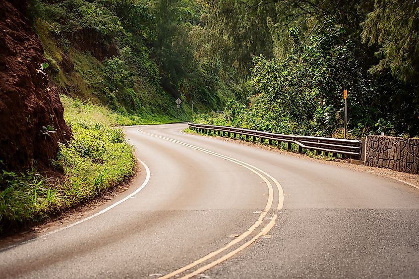 Picturesque narrow part of Kuhio Highway also known as Route 56 on the North Shore of Kauai, Hawaii