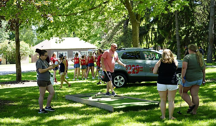 Family members come together to play mini golf at Lakeside park. in Fond du Lac, Wisconsin