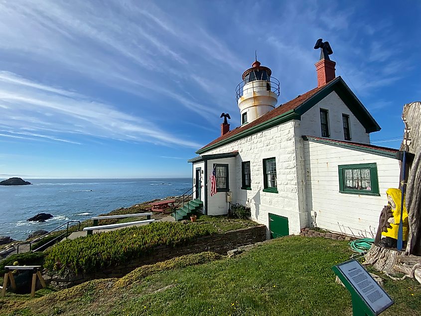 A 19th century light station atop a small island on the Pacific Coast.