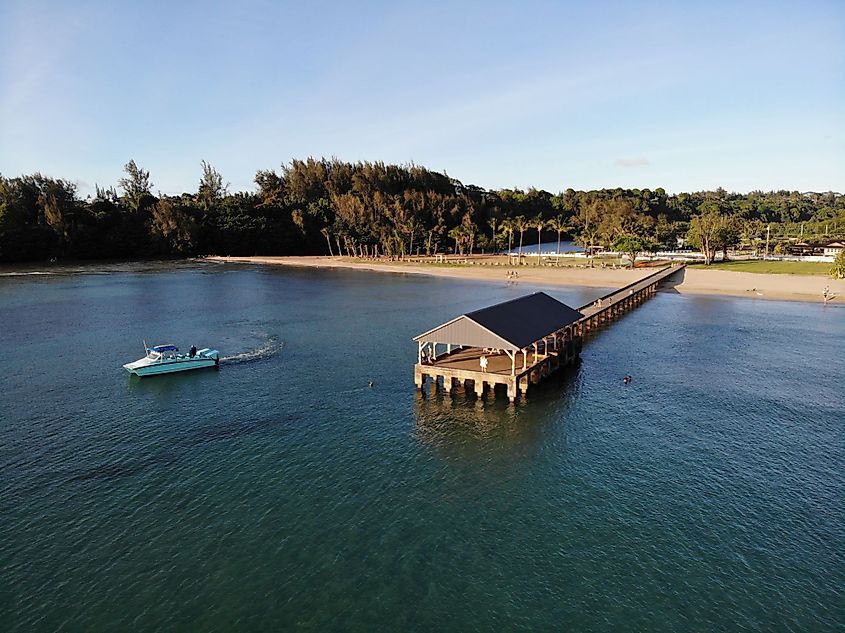 Aerial view of the famous Hanalei Pier at sunset