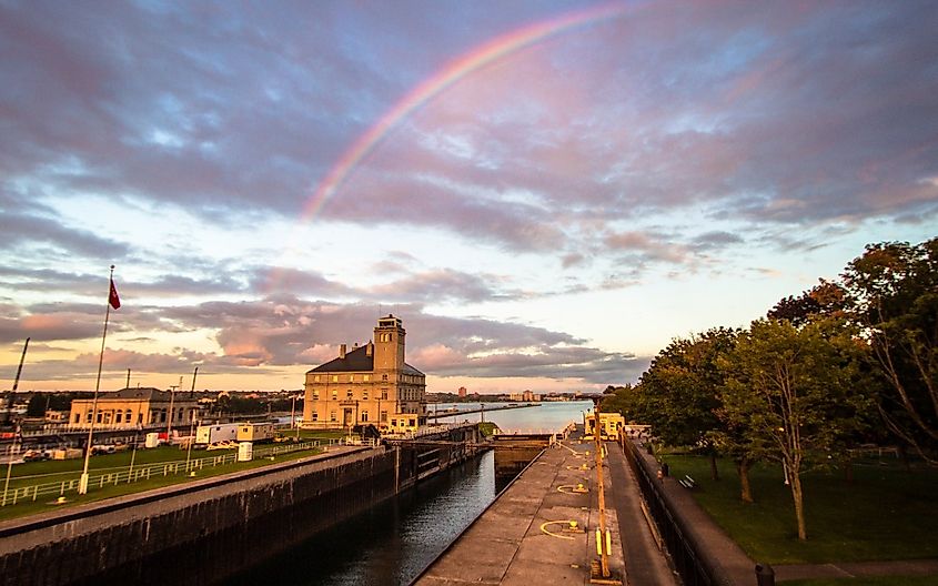 The Soo Locks on the St. Mary's River in Sault Ste. Marie, Michigan framed by a rainbow.