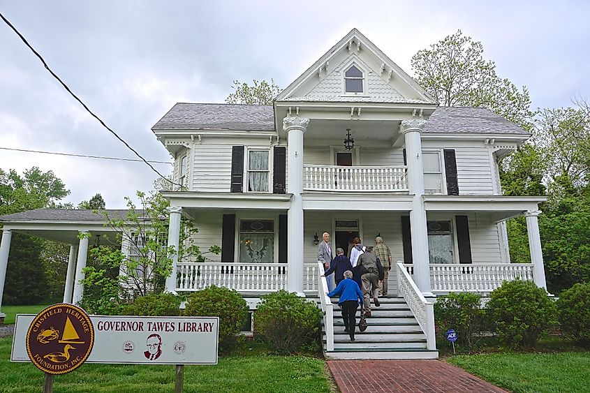 Crisfield, Maryland: Visitors entering the J. Millard Tawes Library.  The former home of Maryland's 54th governor is now a museum owned by the Crisfield Heritage Foundation. 