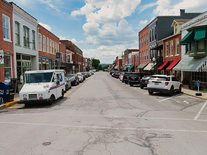 Cars angle parked in downtown Main Street in Weston, Missouri.
