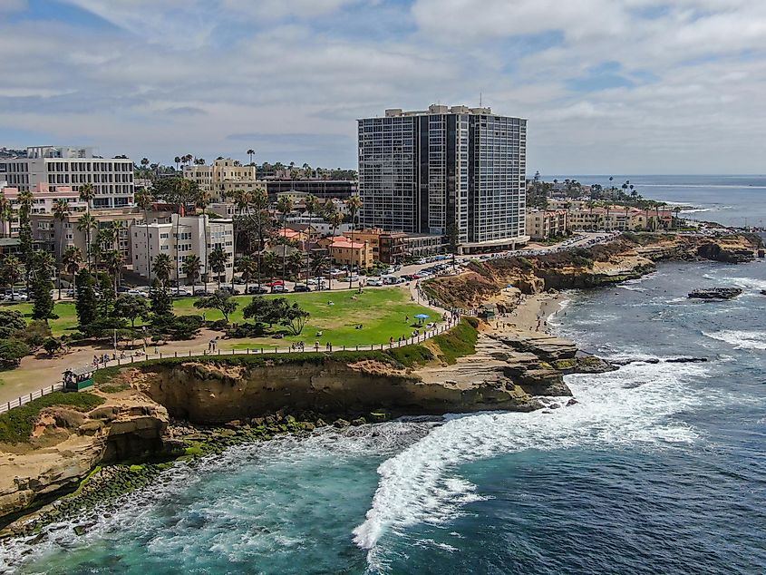 Aerial view of La Jolla Cove, small picturesque cove and beach surrounded by cliffs, San Diego, California