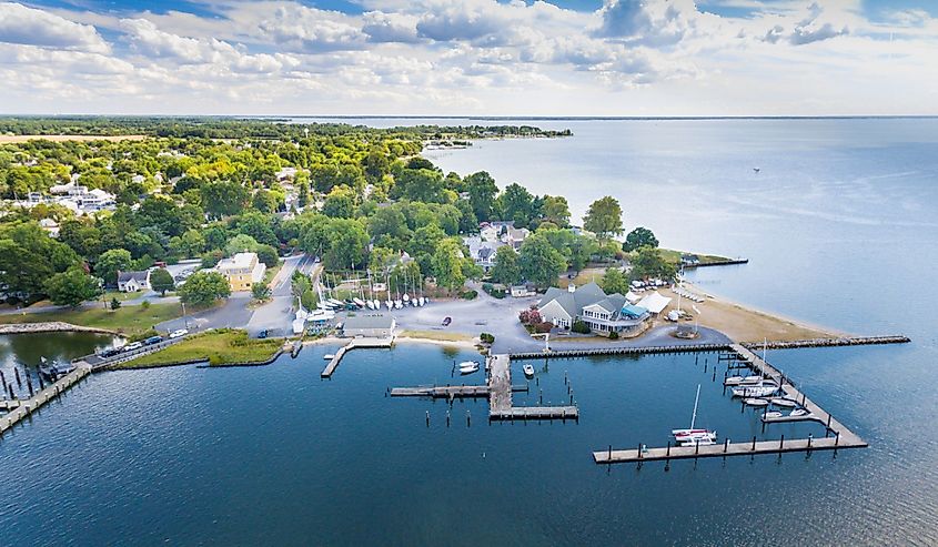 Aerial view of Oxford, Maryland on the Chesapeake Bay with clouds, water, and shoreline.