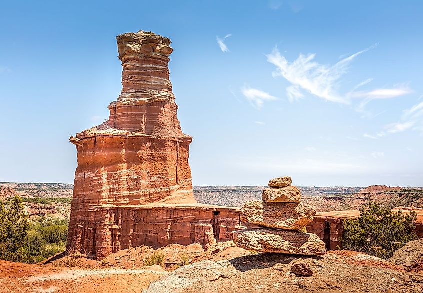 The famous Lighthouse Rock and a stone pile at Palo Duro Canyon State Park, Texas