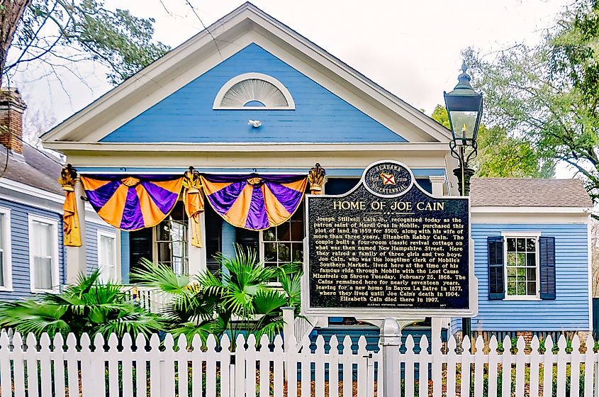 Mobile, Alabama, USA - Jan. 30, 2023: A historic marker stands in front of Joe Cain’s home in Mobile, Alabama. Joseph Stillwell Cain is known as Mobile’s patron saint of Mardi Gras.