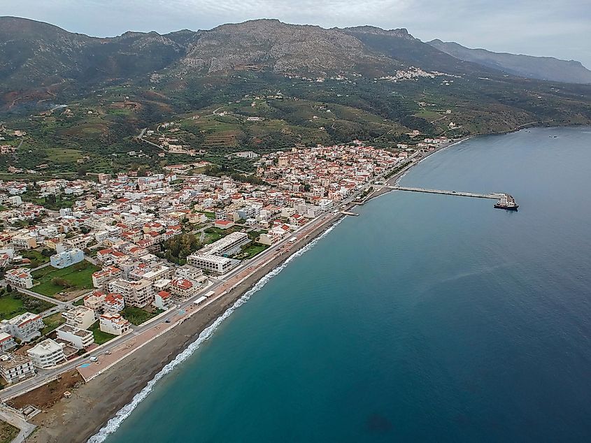 Aerial cityscape view of Neapolis town at sunset. 