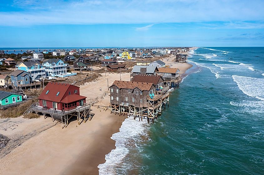 Overlooking beach houses and waves crashing on the beach in Rodanthe, North Carolina