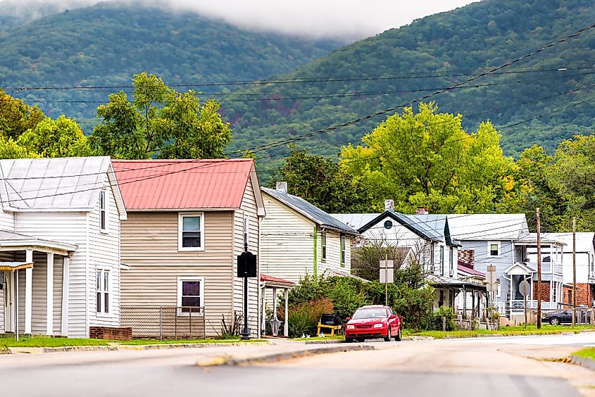 Buena Vista, Virginia small countryside rural town in Blue Ridge mountains, USA in fall autumn with empty residential street road by houses homes