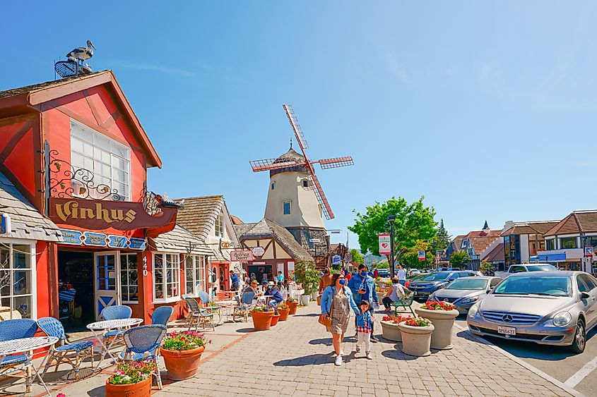 Main street, street view, and tourists in Solvang, a beautiful small town in California that is known for its traditional Danish style architecture