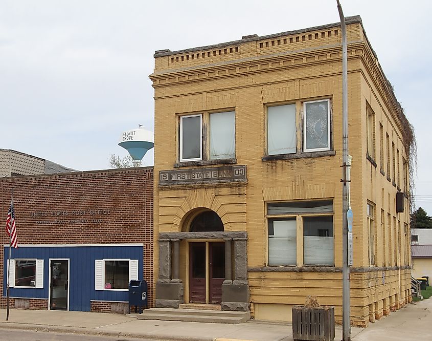 U.S. Post Office, First State Bank Building, and water tower in Walnut Grove.