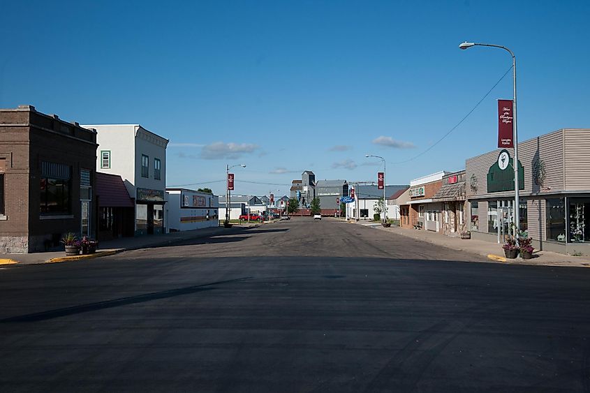 Main street of Walhalla, North Dakota, featuring shops on both sides.