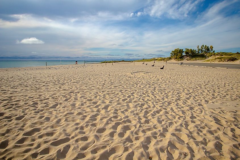 Wide sandy beach and Lake Michigan coast at one of Michigan's most popular state park.