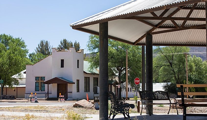 Afternoon sunlight shines on a church and gazebo in the historic downtown core of Patagonia, Arizona.