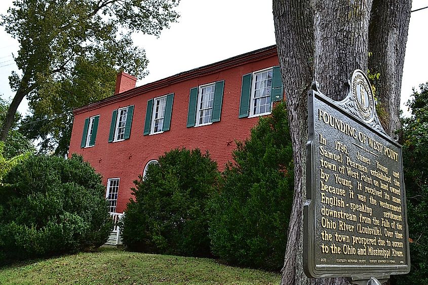 Red facade of the James Young House and Inn, West Point, Kentucky