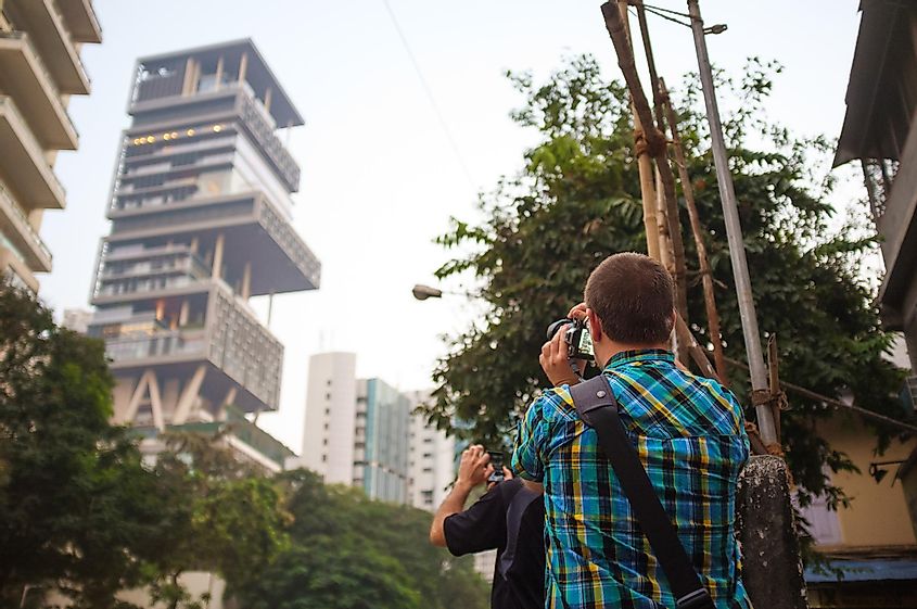 Tourists photographing the most expensive house in Mumbai India