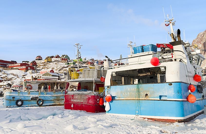 The frozen harbor of Uummannaq during winter in northern West Greenland.