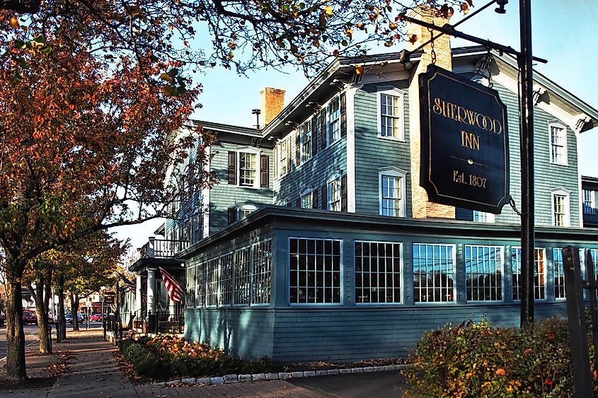 The outside of the Sherwood Inn, a historical landmark in Skaneateles, New York, via debra millet / Shutterstock.com