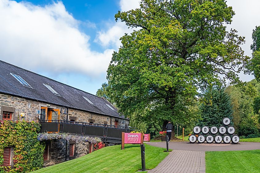 Dewar's Distillery sign and headquarters in Aberfeldy, Scotland. Editorial credit: gg-foto / Shutterstock.com