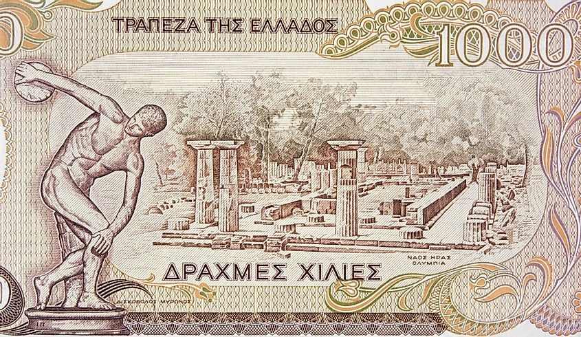Temple of Hera in Olympia and Discobolus of Myron sculpture on old Greece drachma banknote.