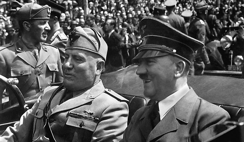Benito Mussolini and Adolf Hitler riding together in Munich. 