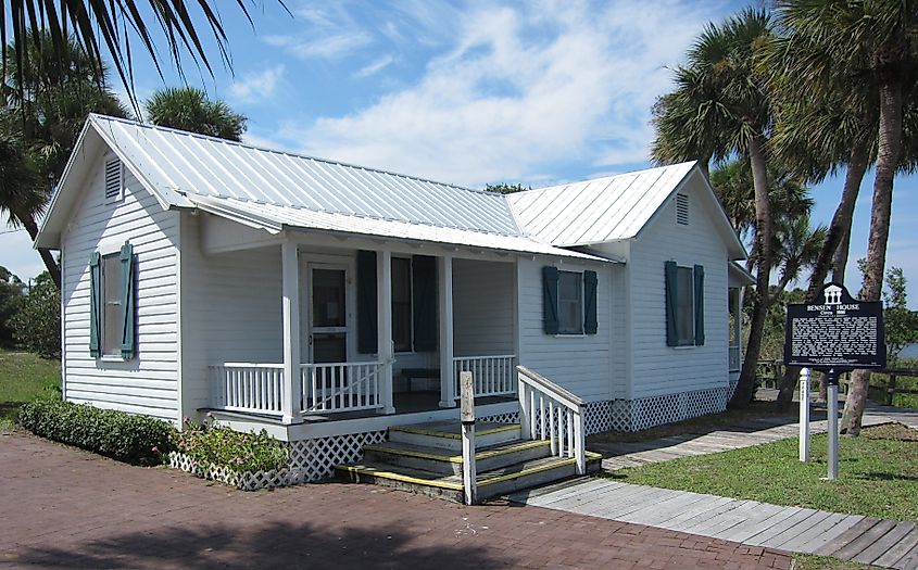 Bensen House sitting along US Route 1 in Grant, Florida, with its historic wooden exterior and surrounding trees