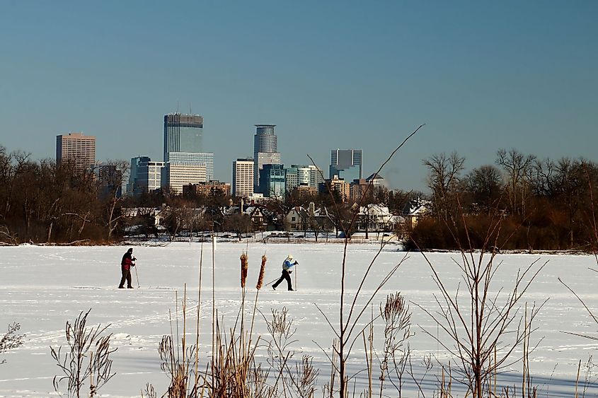 Skiing under the Minneapolis skyline on Lake of the Isles