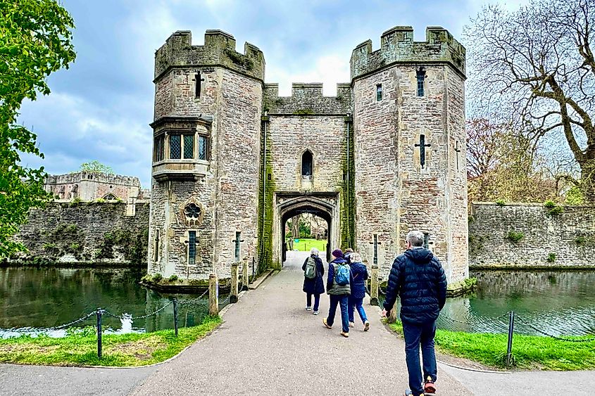 People strolling around the Bishop's Palace, Wells. Image credit: Bryan Dearsley
