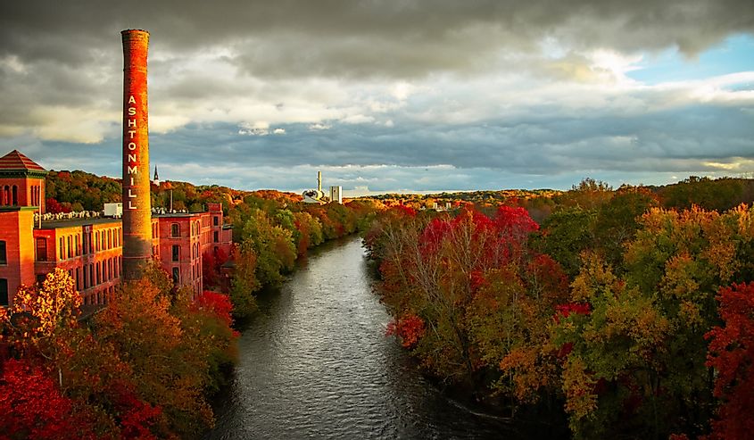 The Blackstone River in Cumberland, Rhode Island off of Rt 116 bridge with beautiful autumn foliage and fall colors.