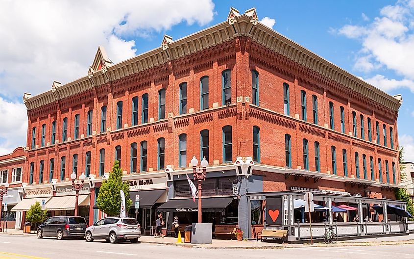 Franklin, Pennsylvania: A large three story brick building that houses businesses and retail shops on the corner of West Park and Liberty streets