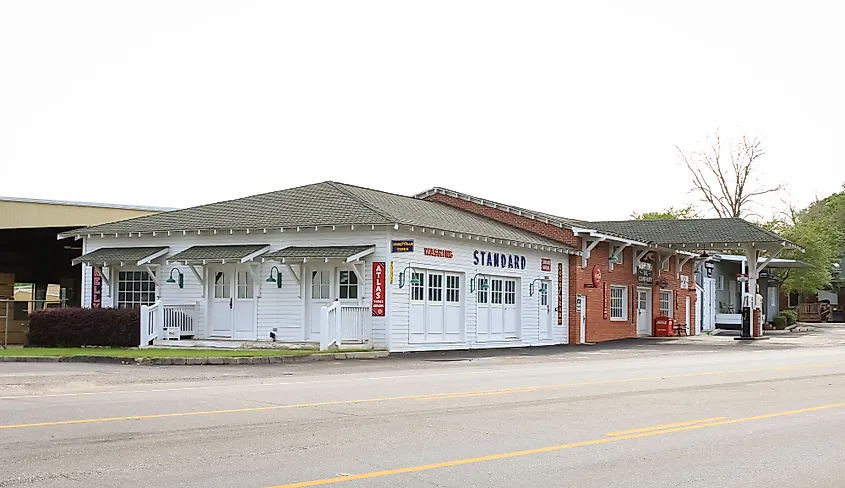 A historic gas station with vintage signs in Abbeville, Alabama
