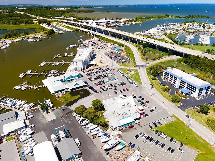 View of the bay with marina, waterfront, large parking for yachts and cars on Kent Island in Virginia.