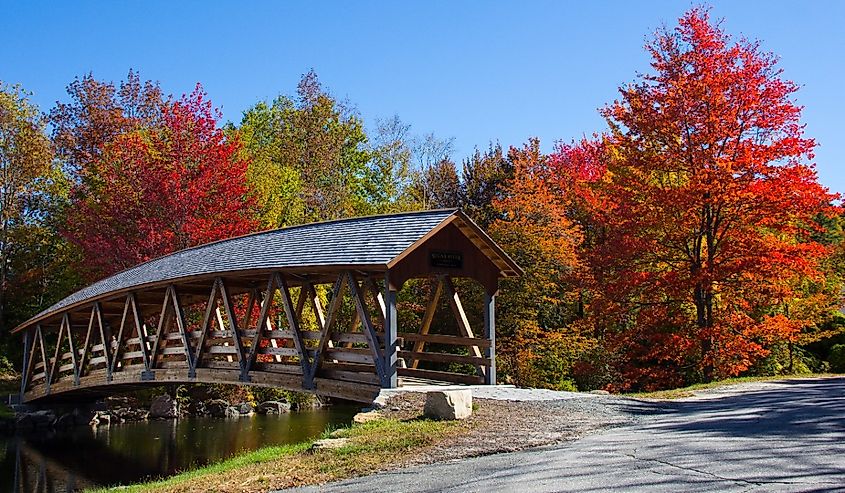 Covered bridge and fall colors in Sunapee, New Hampshire.