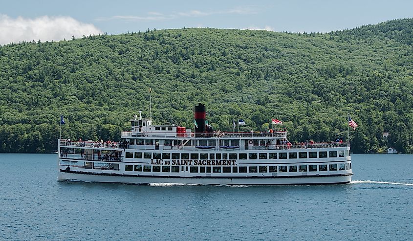 Passenger steamboat carrying tourists on a cruise to see the sights of the Lake George