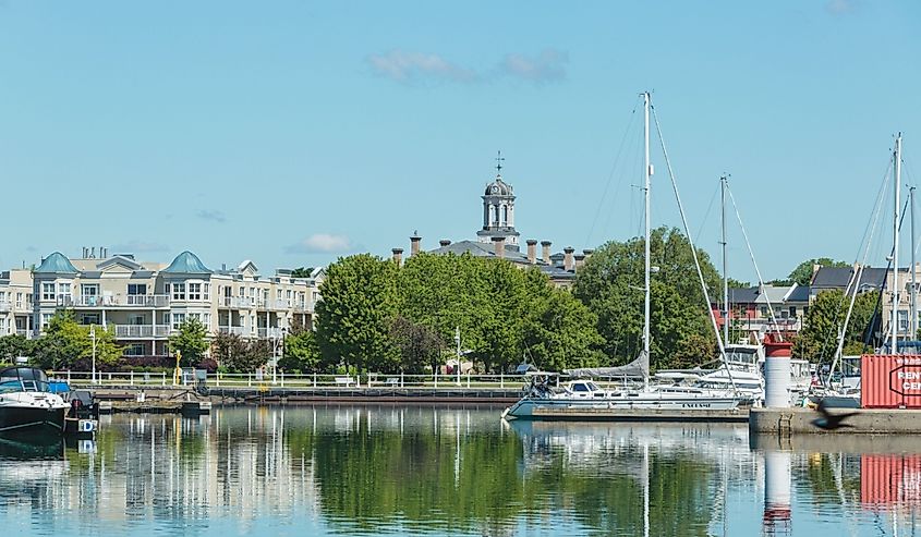 Victoria Hall clock tower and Cobourg marina on a beautiful sunny morning in late Spring