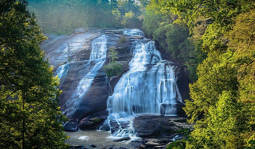 An early morning misty photo of High Falls of Dupont Forest in Brevard