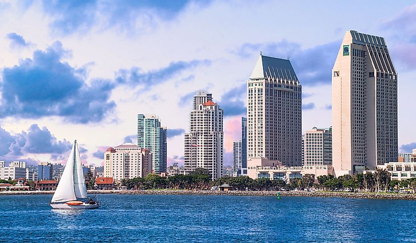 Sailboat on the water and the skyline and downtown San Diego, California 