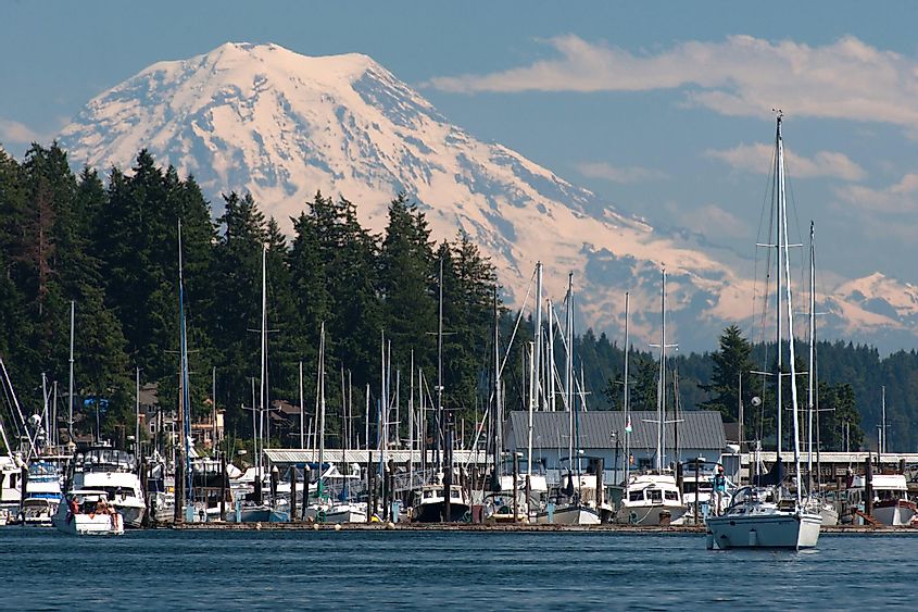 Majestic Mount Rainier stands tall in the background, casting its shadow over the peaceful town of Gig Harbor, Washington.