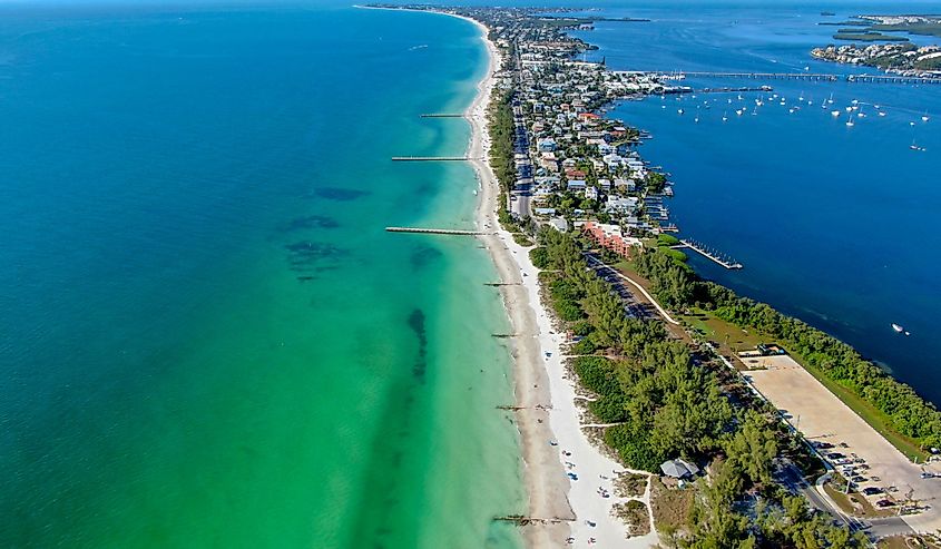 Aerial view of Coquina Beach with white sand beach and the main road, Anna Maria Island, Florida
