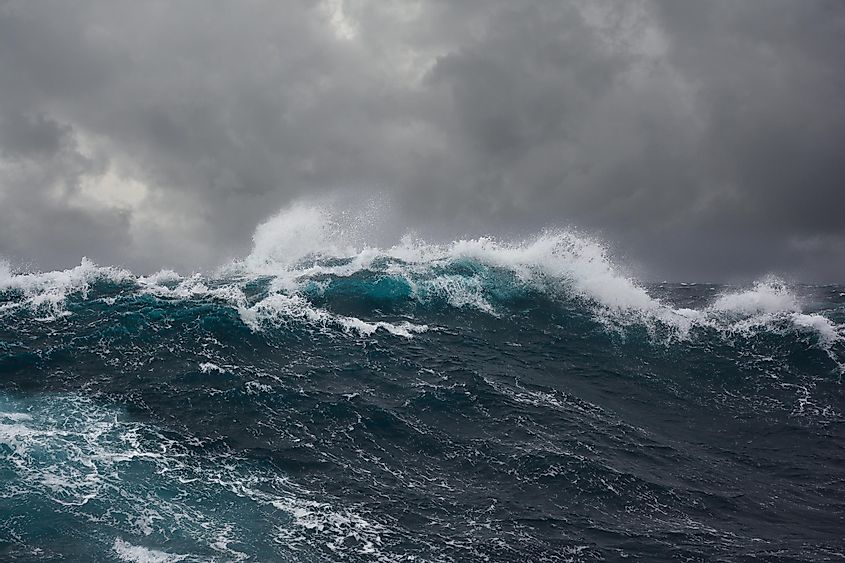 Swell waves caused by a storm in the ocean.