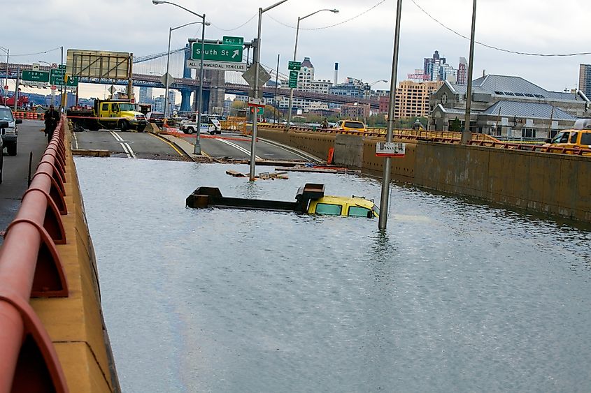 Flooded tunnels, damaged buildings, and uprooted trees in Manhattan and Brooklyn after Hurricane Sandy